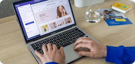 Person customizing a product on laptop